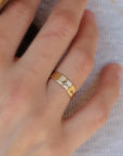 Woman wearing 14K solid gold handwriting ring on finger, showing engraved message