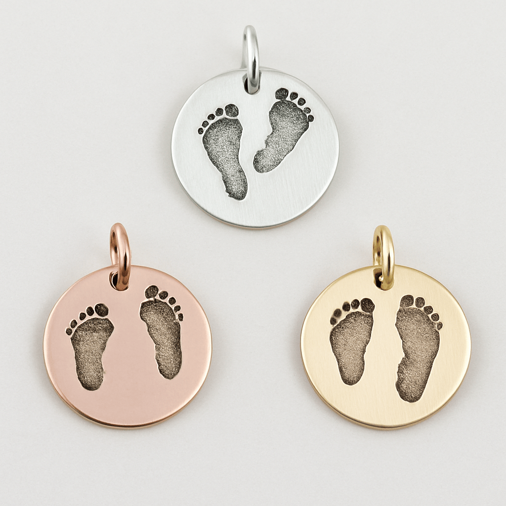 Custom baby footprint charm engraved on round sterling silver pendant