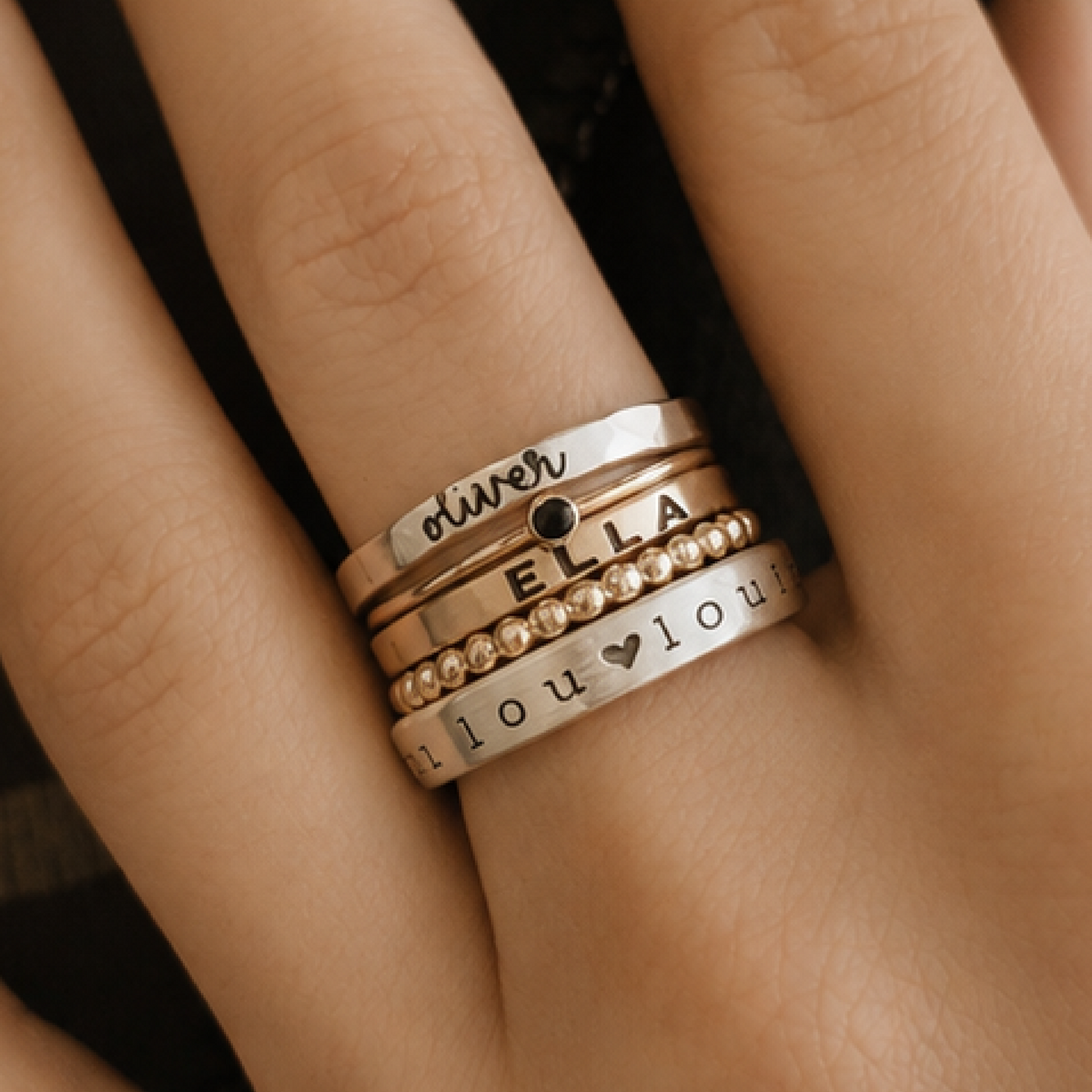 The Anniyah Stacking personalized boho stacking name ring set with silver and 14K gold-filled rings and cubic zirconia accents