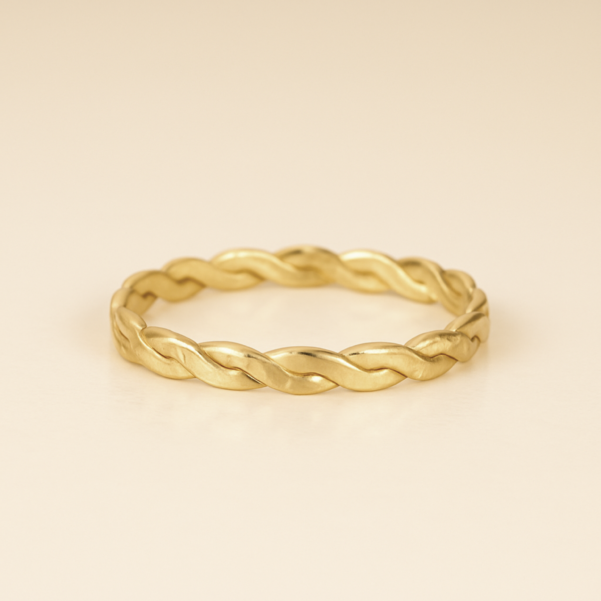 Handcrafted woven braided ring in 14K gold-filled with twisted design and brushed finish for elegant style