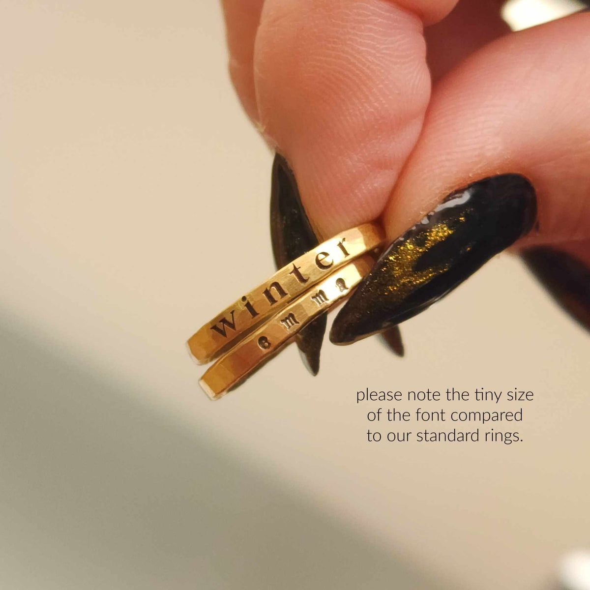 2mm handmade name rings comparing each other with two different fonts and font sizes