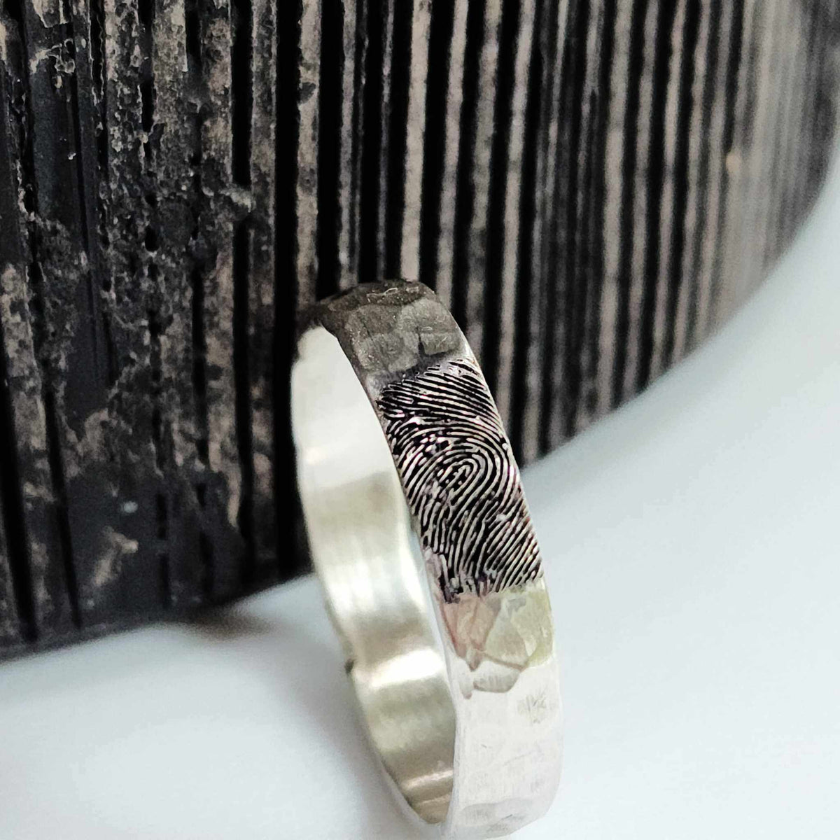 Sterling silver fingerprint ring with custom engraved fingerprint and hammered texture