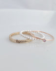 yellow gold personalized ring engraved in our lower cursive font, sterling silver beaded ring, rose gold birthstone ring