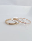 yellow gold personalized ring engraved in our lower cursive font, sterling silver beaded ring, rose gold birthstone ring