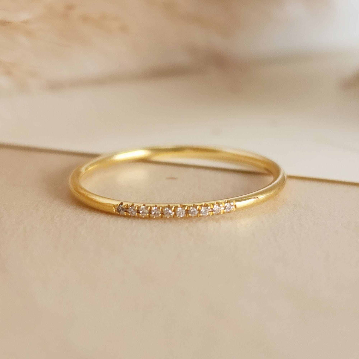 Dainty skinny CZ ring with sparkling cubic zirconias in 14K gold filled or sterling silver, perfect for stacking and everyday wear