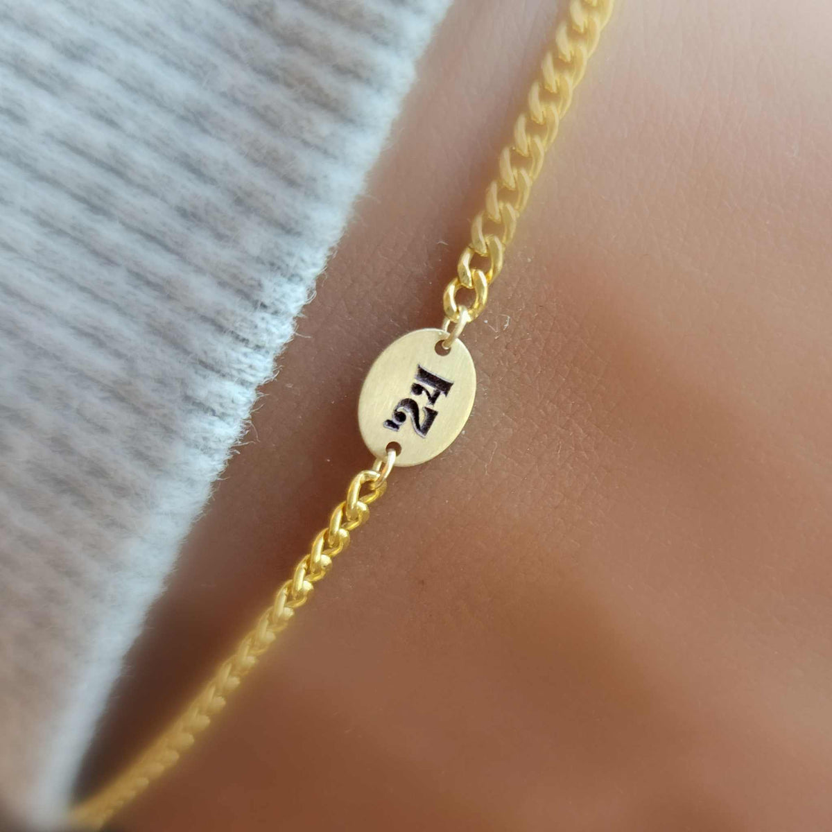 14k gold filled graduation bracelet with customizable year tag and curb chain design