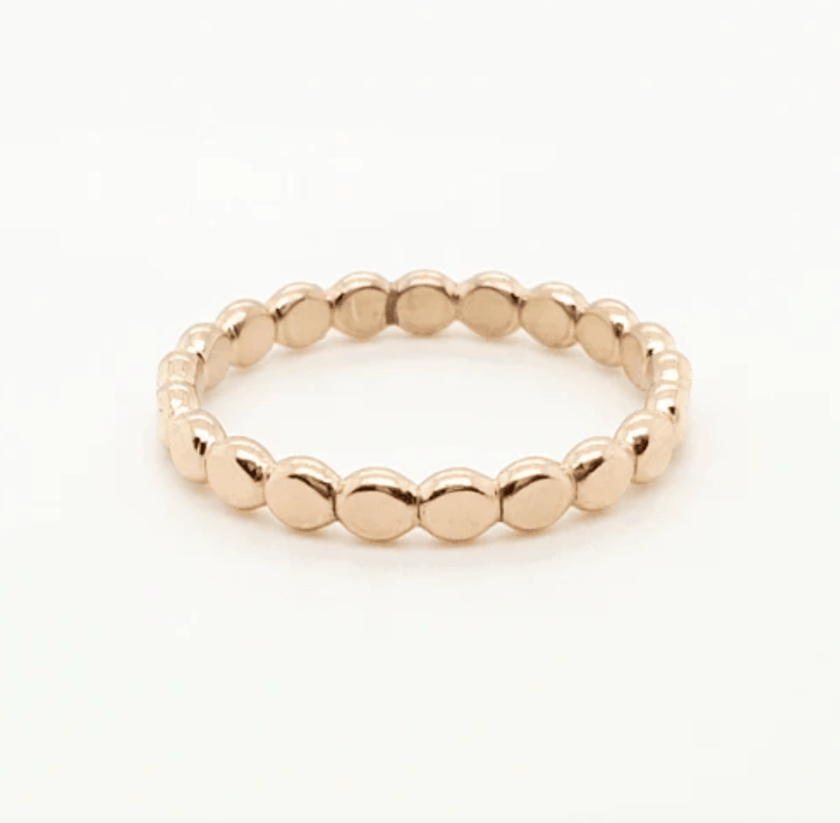 Flat beaded stacking ring in sterling silver, 14K rose gold, and yellow gold finishes for versatile everyday wear