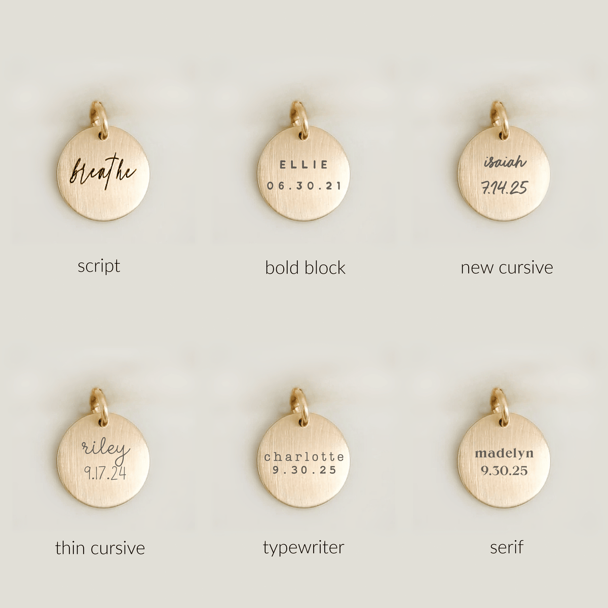Gold pendants with different text styles on a light gray background