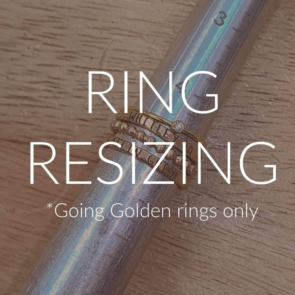 Close-up of gold rings being resized with jeweler's tools for perfect fit