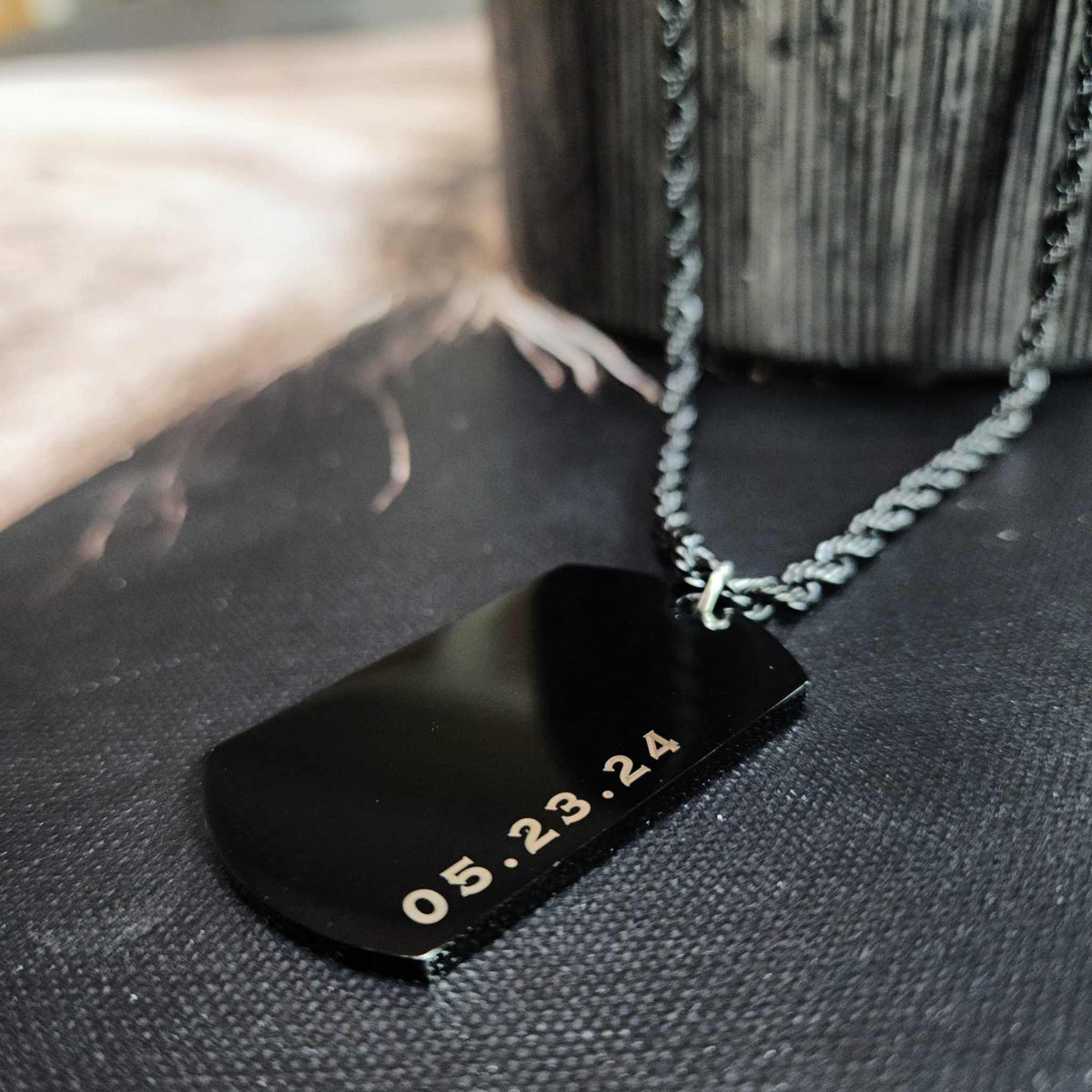 Men's personalized black stainless steel dog tag necklace with customizable engraving on thick dog tag and 24-inch rope chain