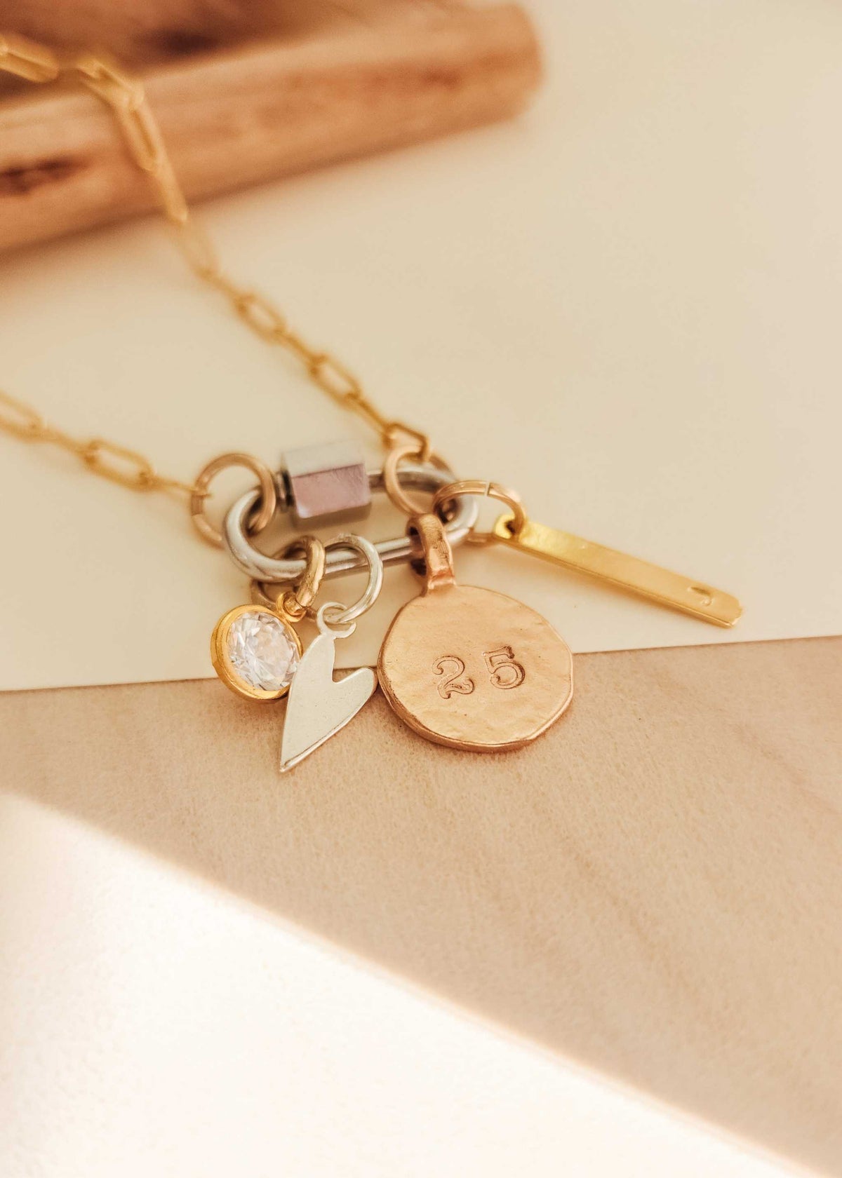 Mixed Metal Carabiner charm necklace with gold-filled paperclip chain and sterling silver clasp