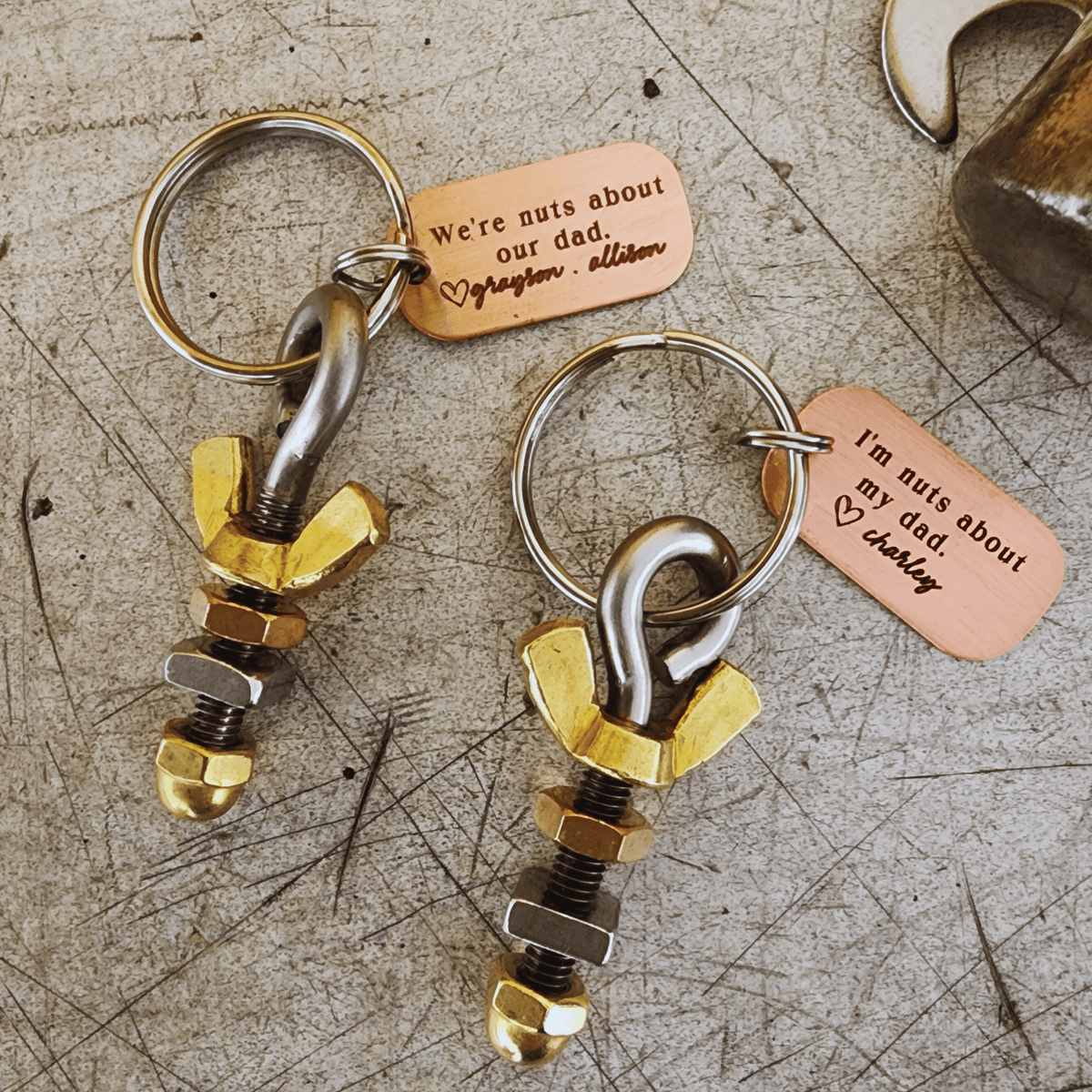 Fathers day gift keyring with bolt, spinning nuts, and engraved copper tag