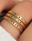 Everyday wear jewelry, stacking rings stamped with tiny font