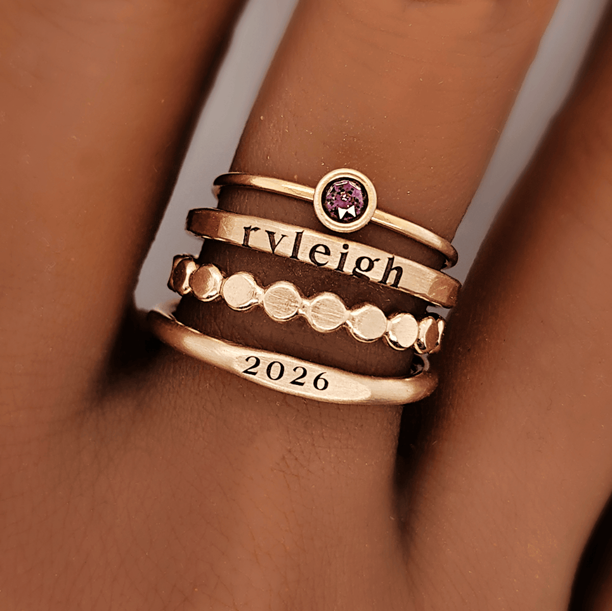 Stackable gold signet class ring set with personalized name, year, and birthstone in 14k gold filled design