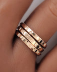 three gold name rings handstamped on hand