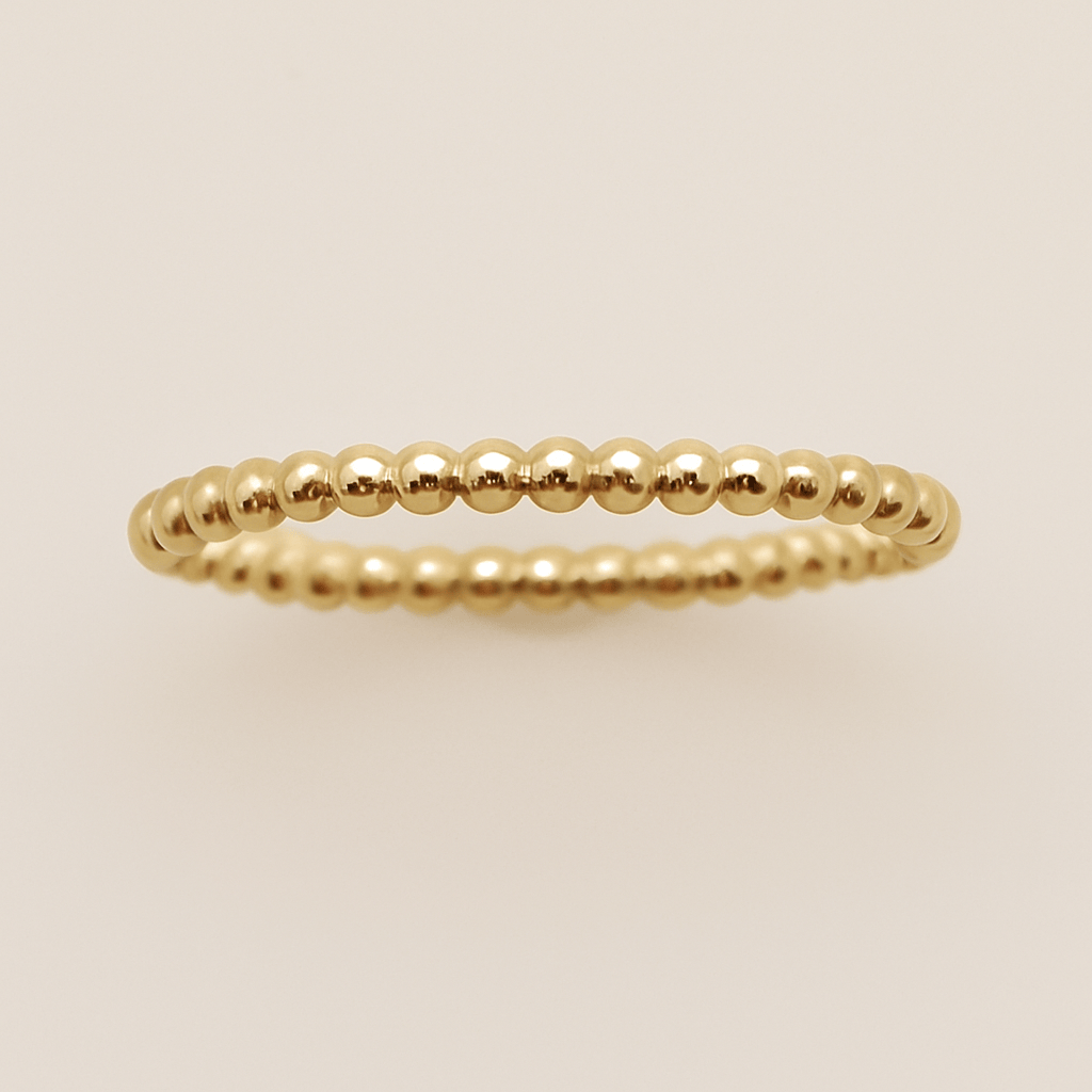 Close-up of a 2mm handmade beaded spacer ring in sterling silver, ideal for stacking and adding elegant style