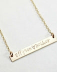 Gold bar necklace with "Ellysen ♥ Dekker" engraving