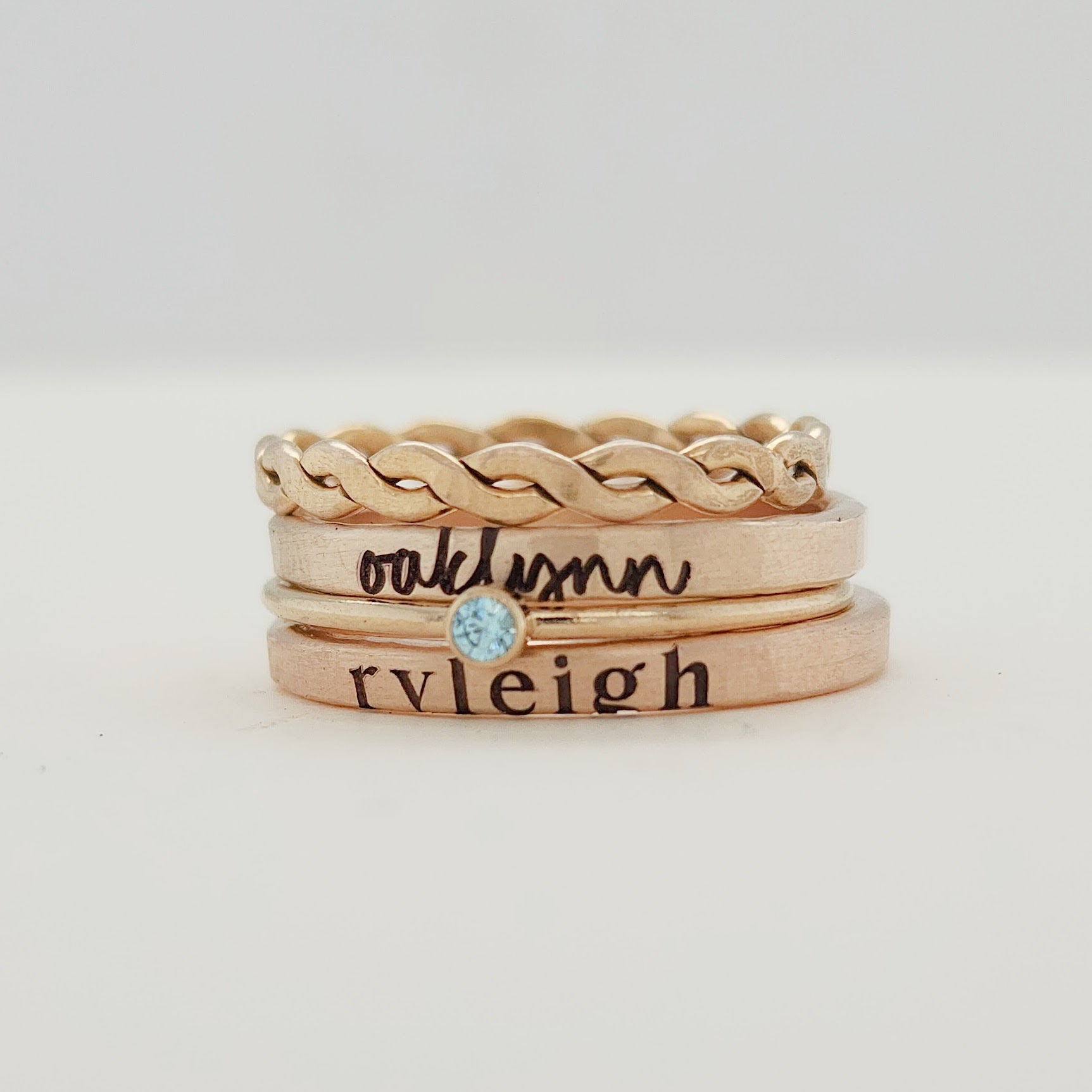 The Marley Set in 14K gold-filled with name, braided, and birthstone rings