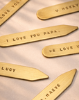 Engraved brass collar stays with loving messages