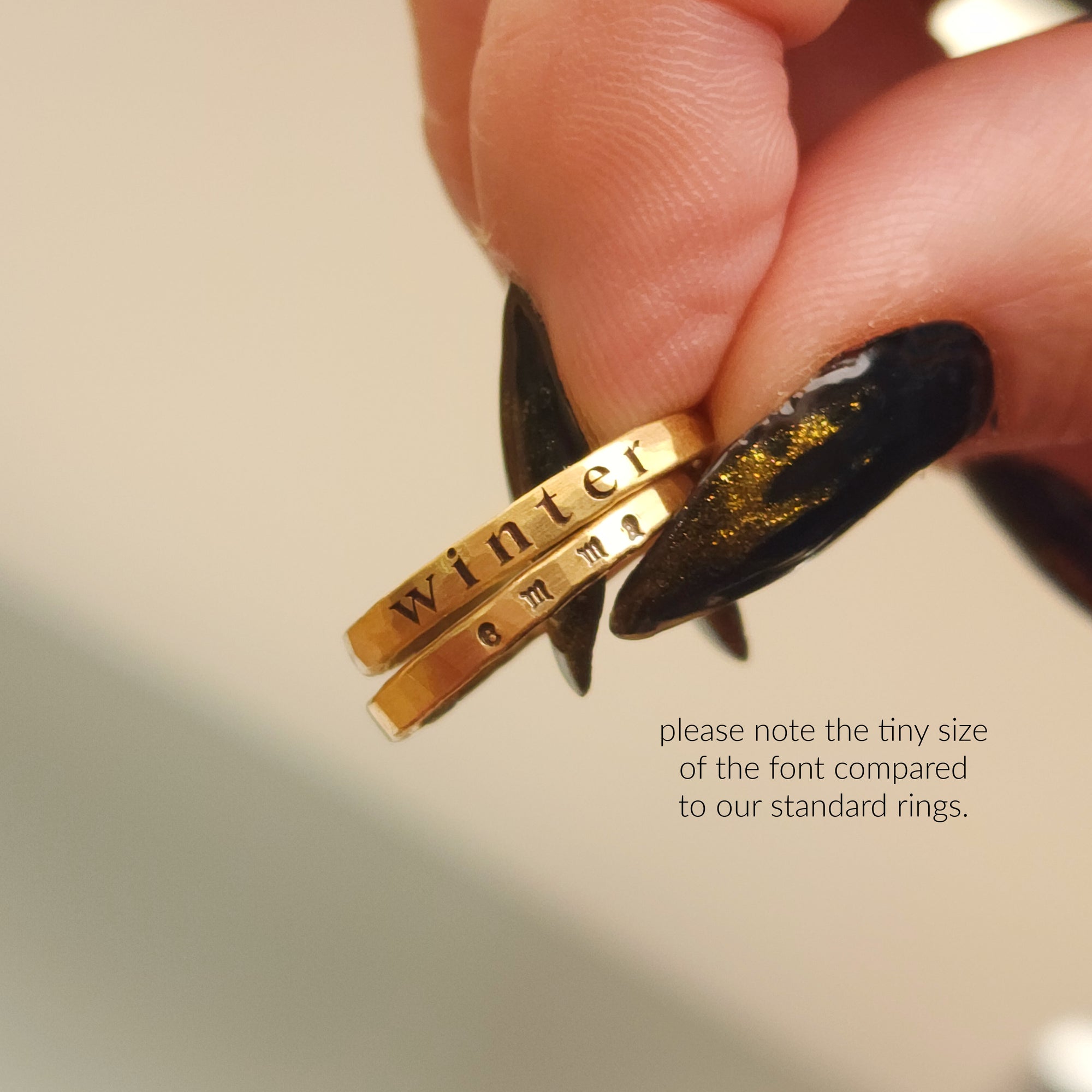 2mm handmade name rings comparing each other with two different fonts and font sizes