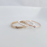yellow gold personalized ring engraved in our lower cursive font, sterling silver beaded ring, rose gold birthstone ring