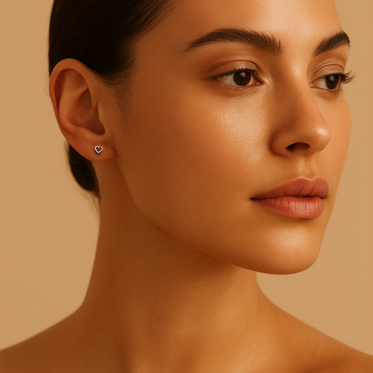 Close-up of a woman's face wearing a heart-shaped earring against a beige background