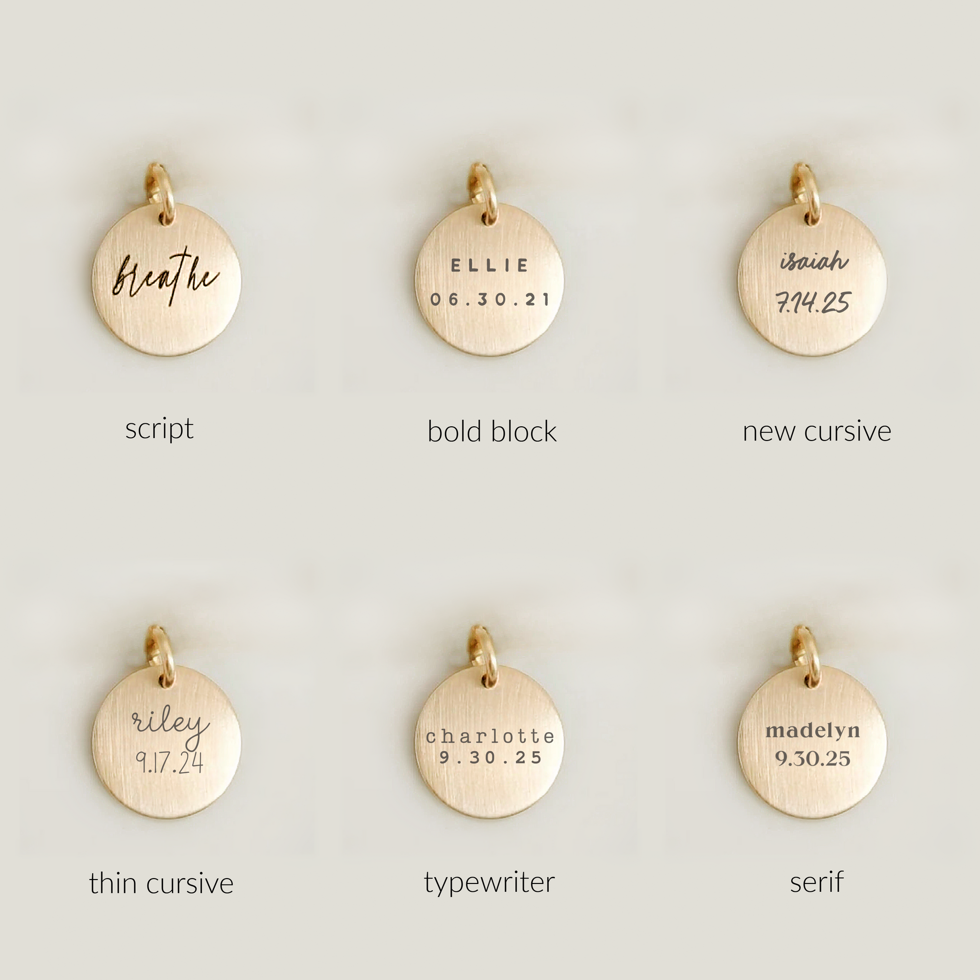 Gold pendants with different text styles on a light gray background
