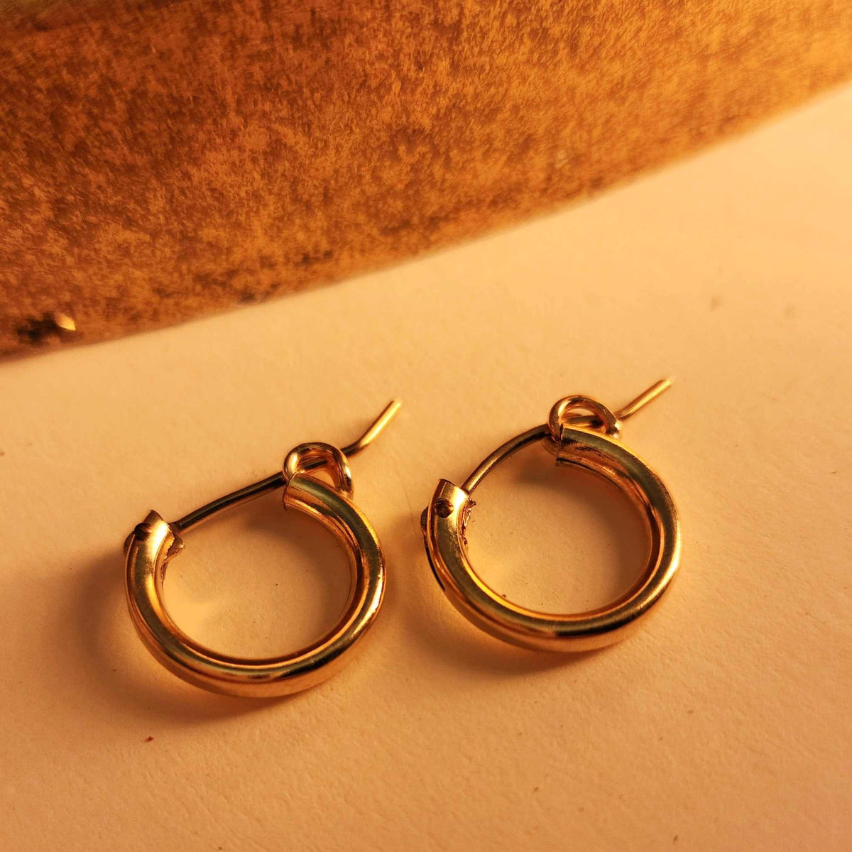 Classic gold and silver hoop earrings in three sizes mini medium large