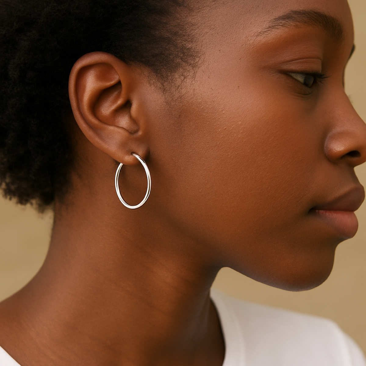 Classic gold and silver hoop earrings in mini, medium, and large sizes