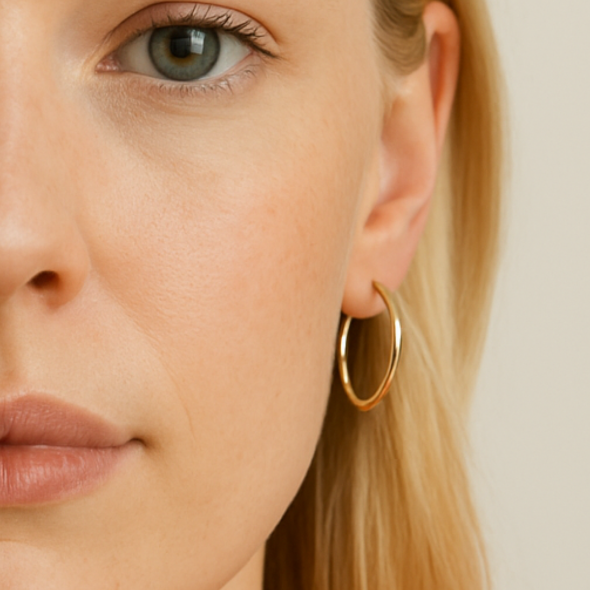 Classic gold and silver hoop earrings in mini, medium, and large sizes