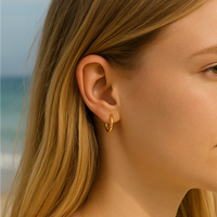 Classic lightweight gold and silver hoop earrings in three sizes for everyday wear