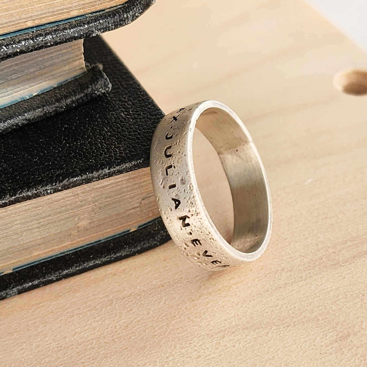 Mens sterling silver name ring with oxidized hammer finish and custom engraving