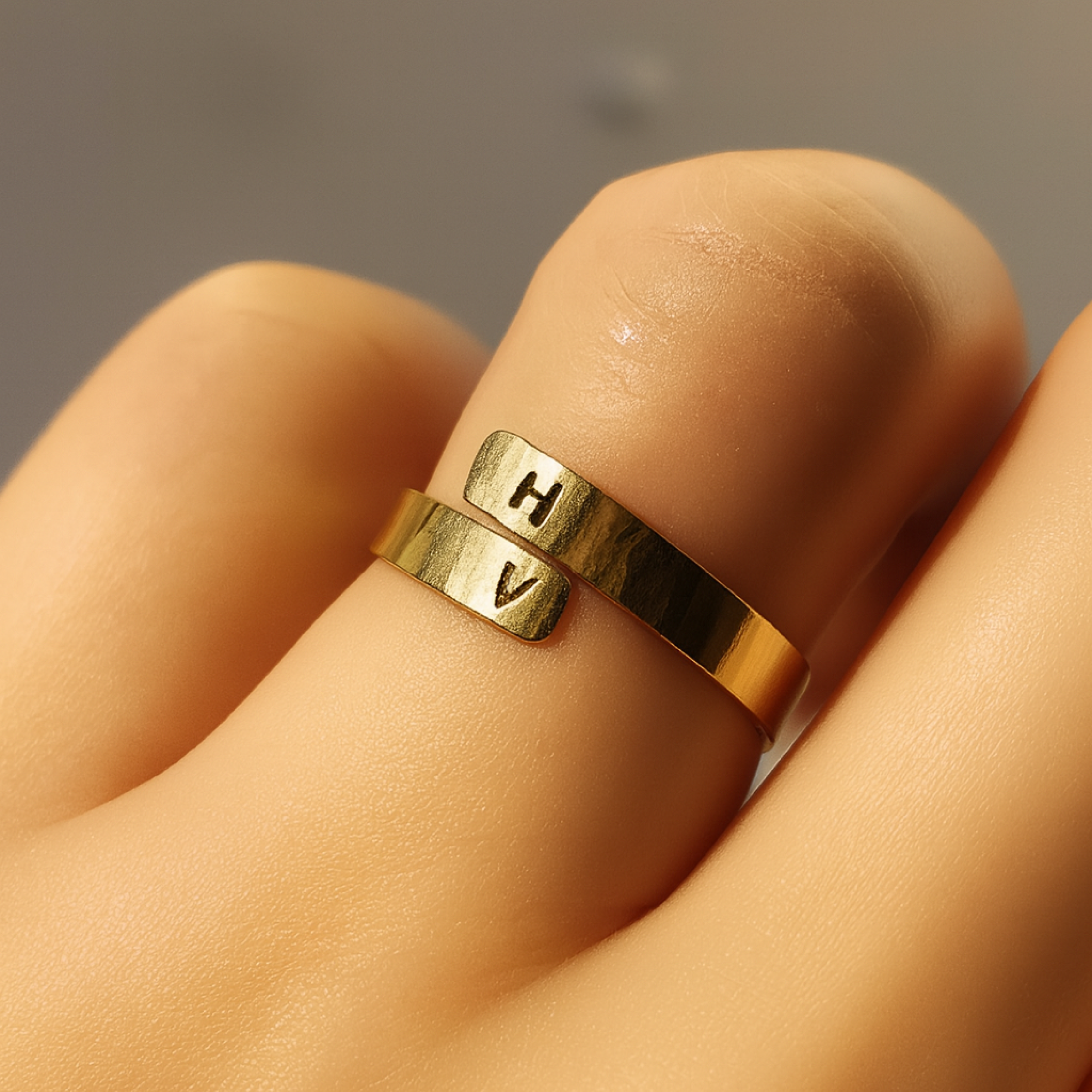 Personalized gold initial cuff ring hand-stamped with letters H and V
