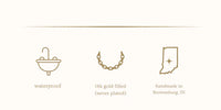 Icons and text indicating waterproof, gold-filled, and handmade in Indiana on a white background.