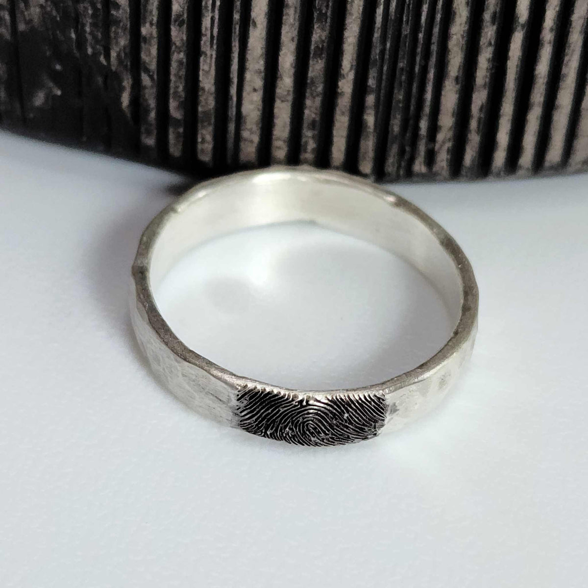 sterling silver fingerprint ring handcrafted with custom engraved fingerprint and hammered texture