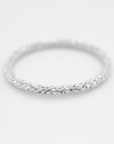 a .925 sterling silver sparkle ring on a white background