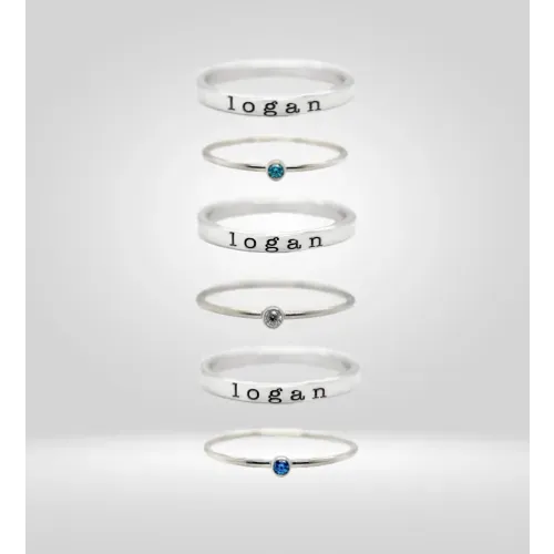 Tyi jewelry rings with Logan and gemstones.