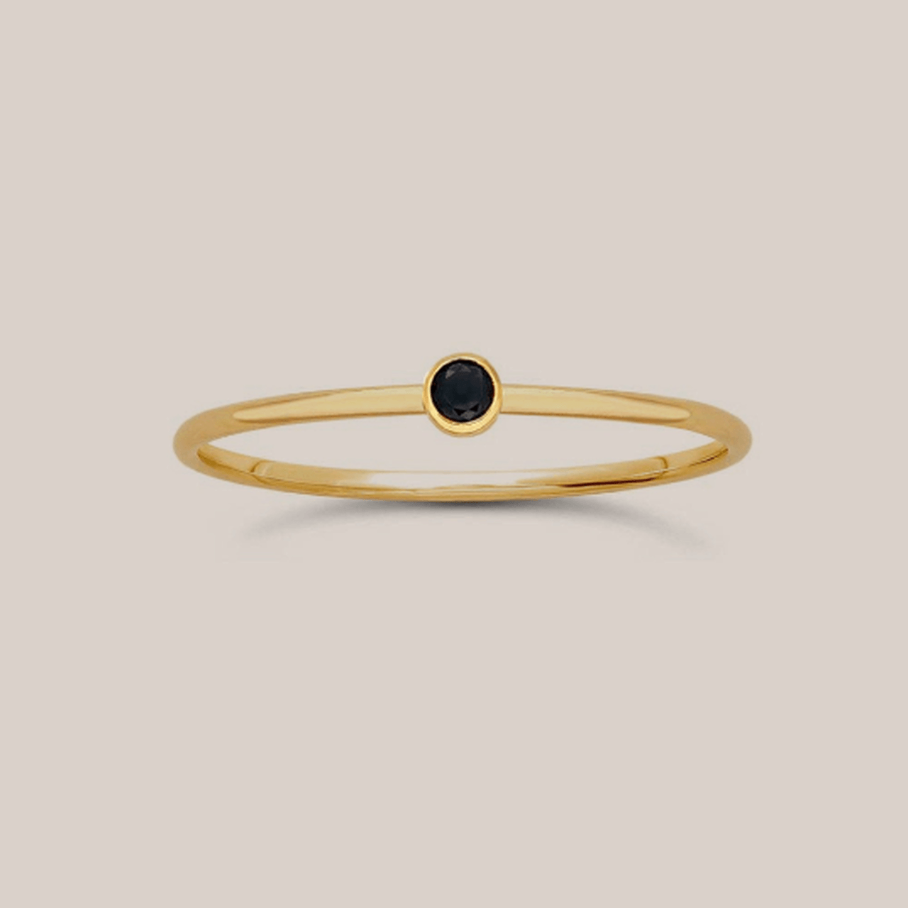 black gemstone ring - Going Golden