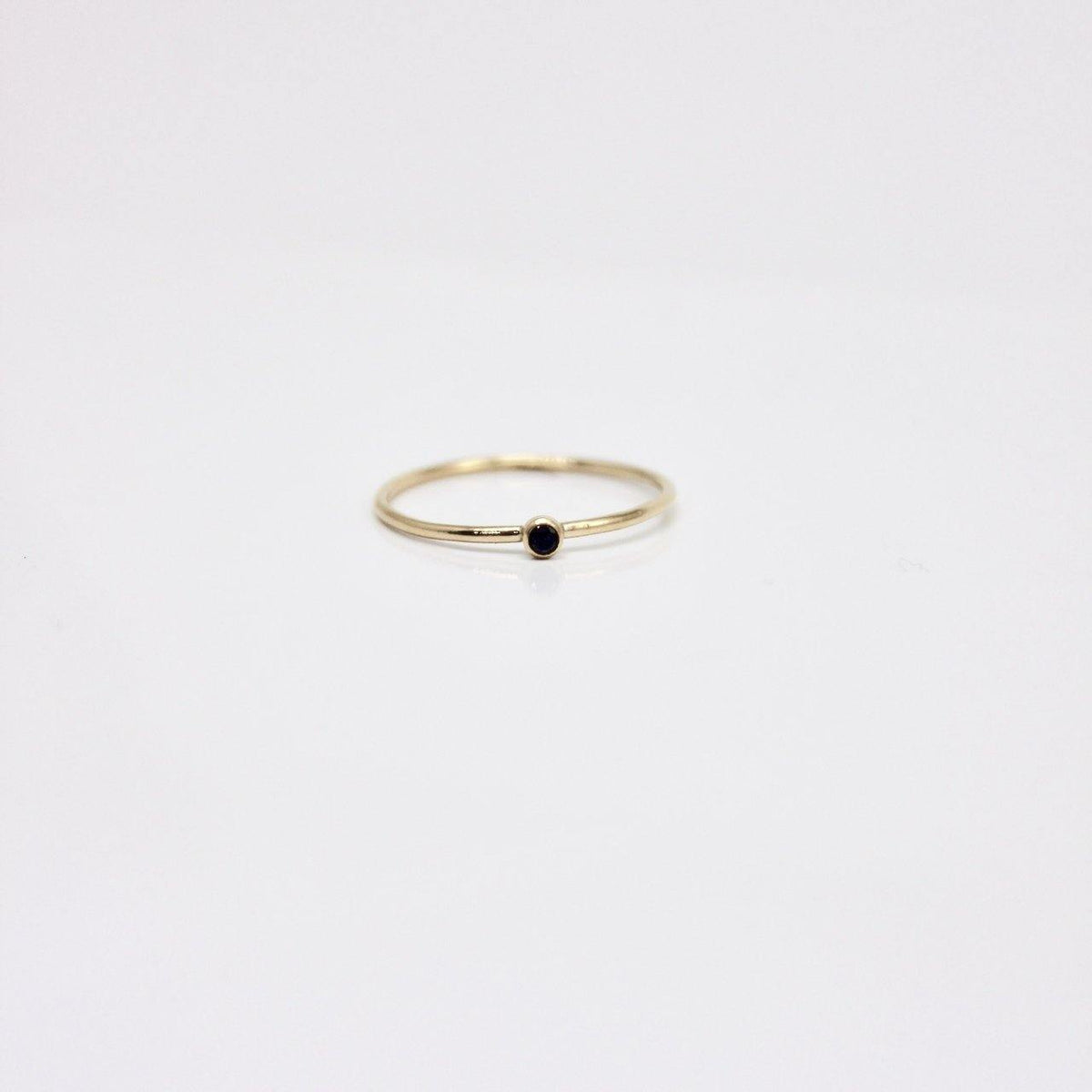 black gemstone ring - Going Golden